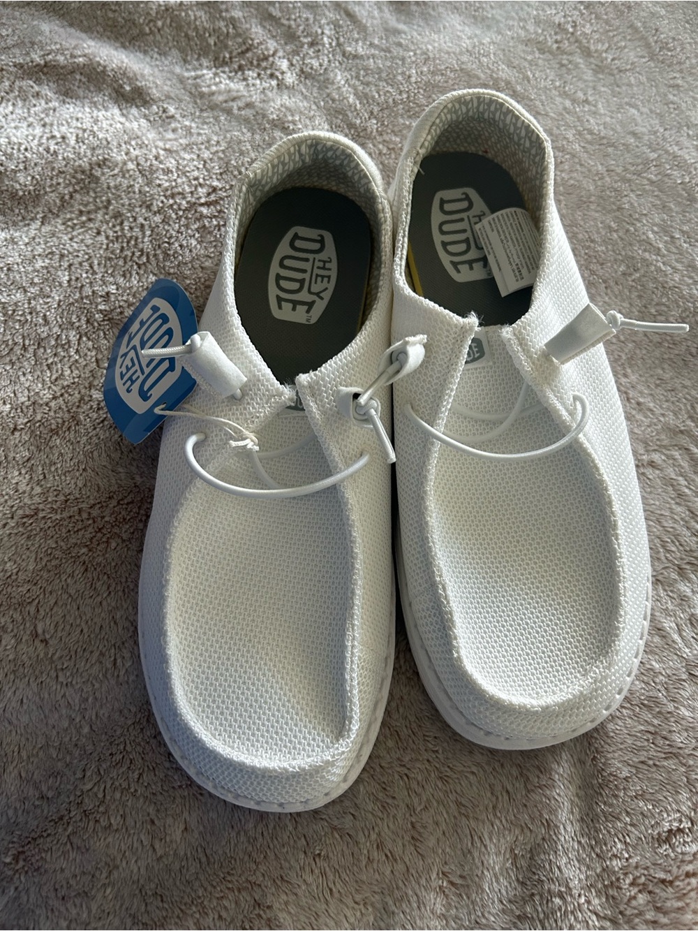 Hey Dude ladies White Slip-On Knit Sneakers. New with tags. W9
